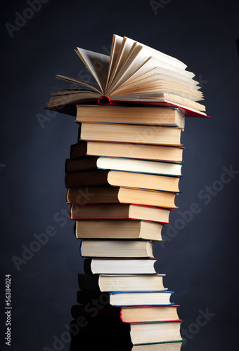 Pile of books on a black background photo