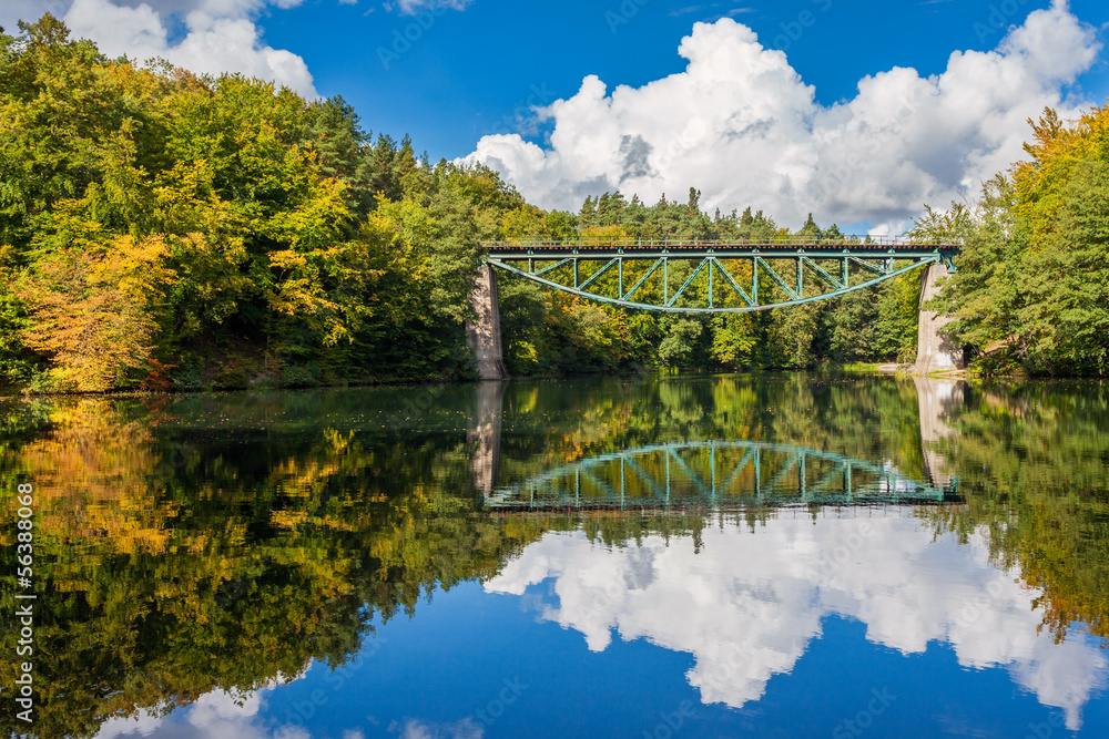 Old railroad bridge over the river Radunia, Poland.
