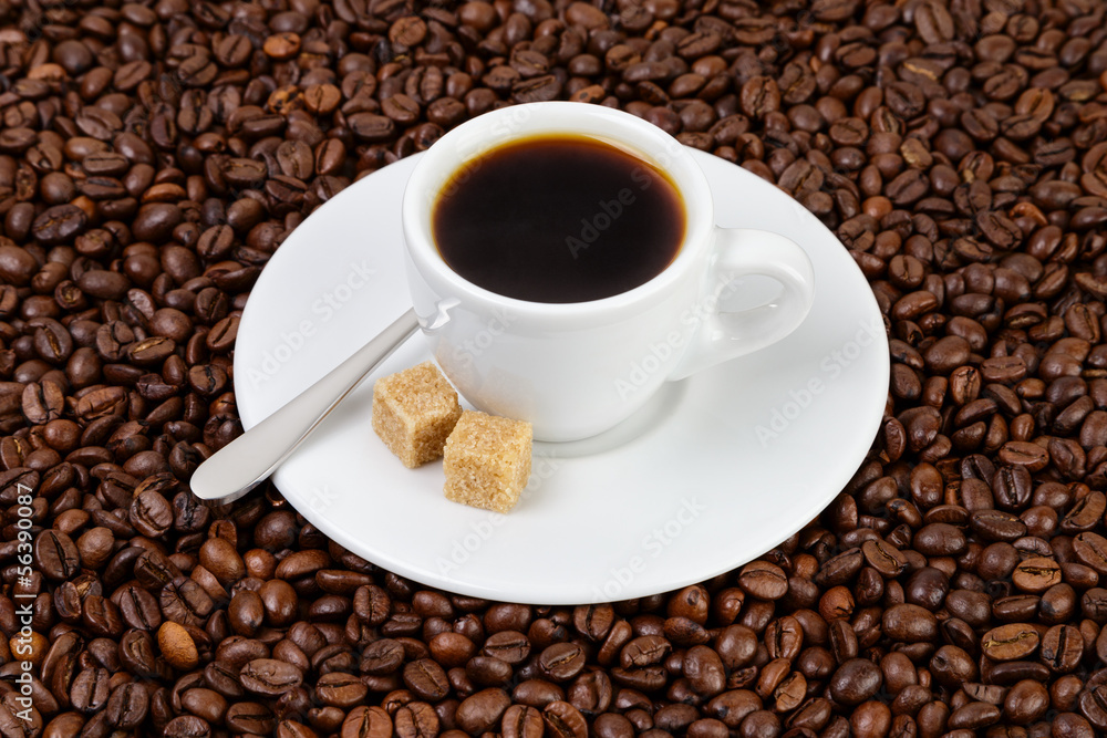 cup of coffee in coffee beans cup of coffee in coffee beans