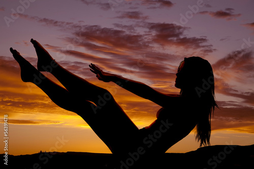 silhouette woman sit legs hands up