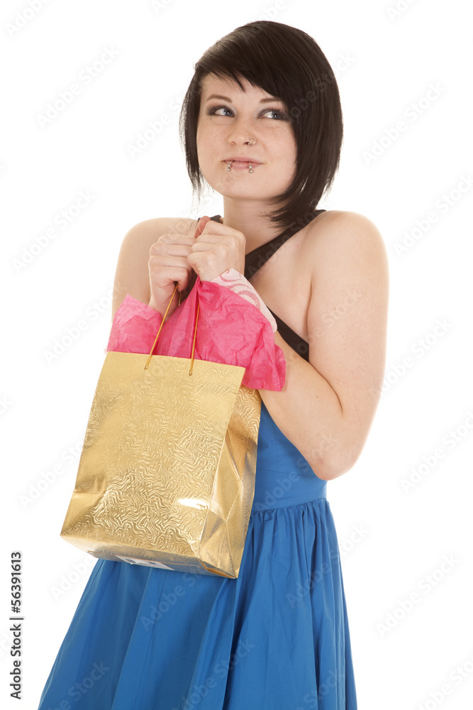 woman blue dress piercings bag hold by chest woman blue dress piercings bag hold by chest