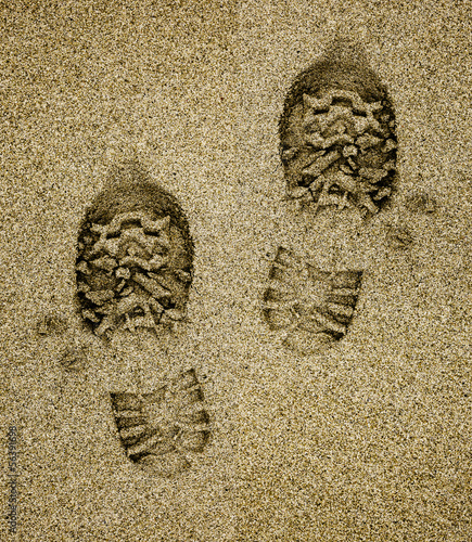 Schuhabdrücke im Sand