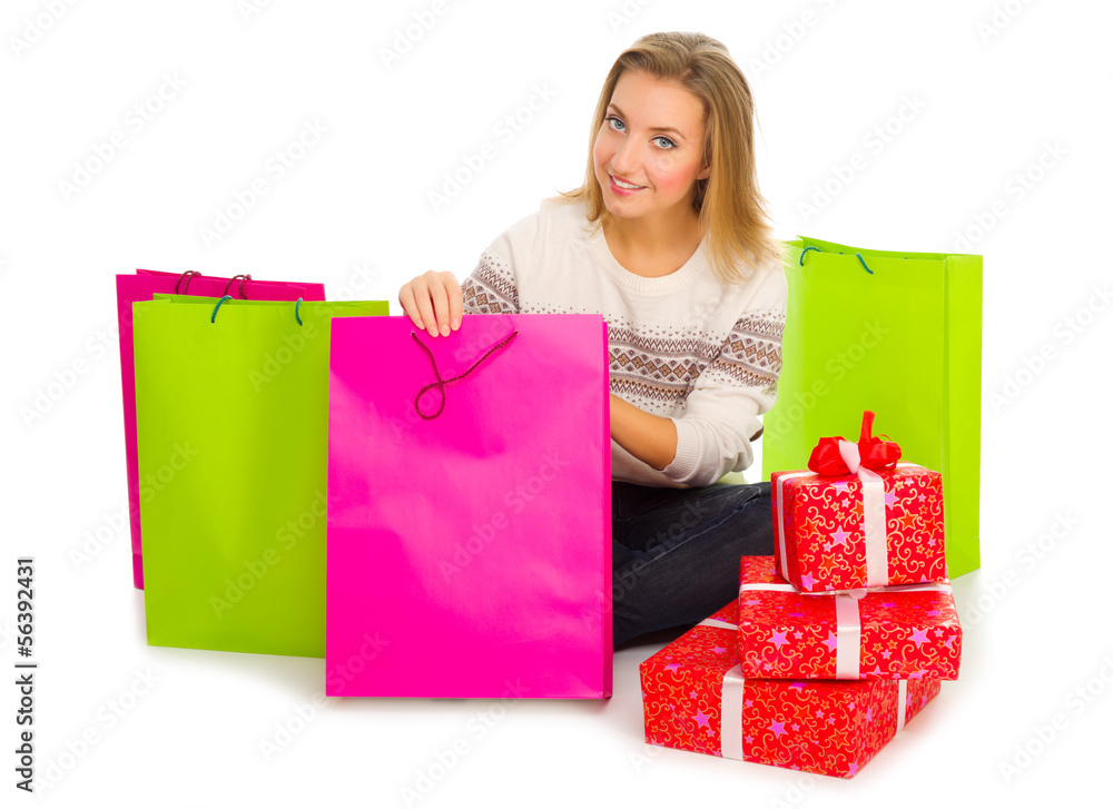 Young girl with bags and gift boxes Young girl with bags and gift boxes