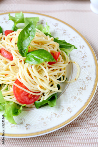 spaghetti with fresh vegetables and herbs