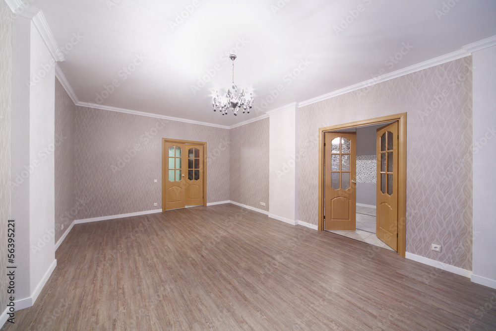 Fototapeta premium Spacious light room with wooden floor and opened doors