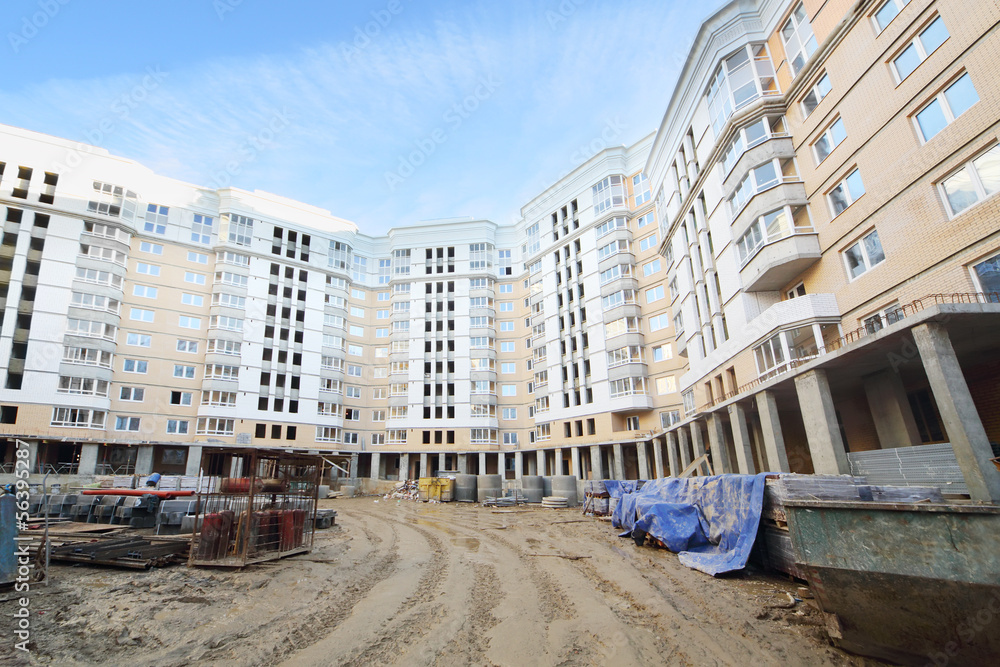 Fototapeta premium Multi-storey building under construction and concrete structures