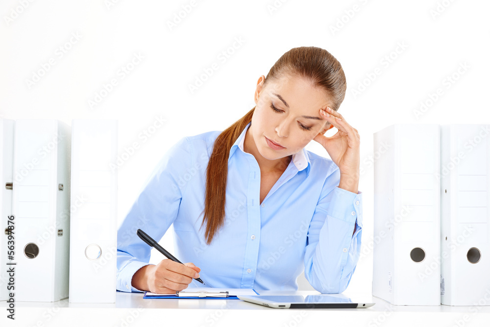 Efficient businesswoman working at her desk Efficient businesswoman working at her desk