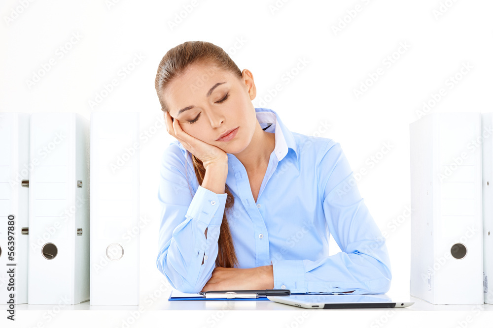Bored or tired businesswoman taking a nap Bored or tired businesswoman taking a nap