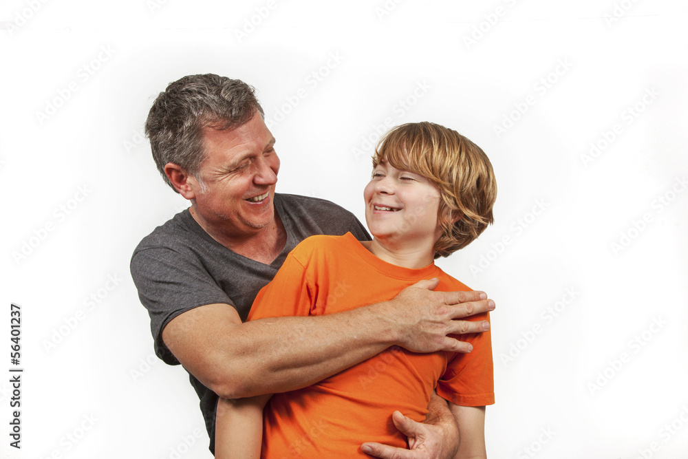 Fototapeta premium father and happy son hugging