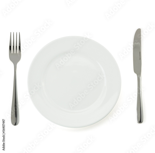 plate, knife and fork  on white