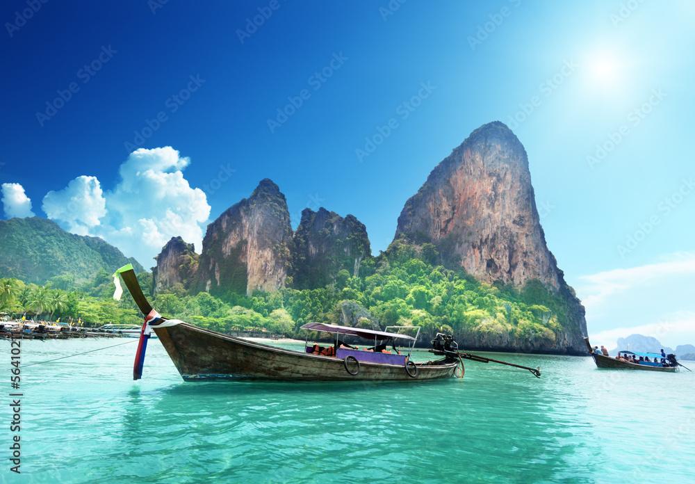boats on Railay beach in Krabi Thailand