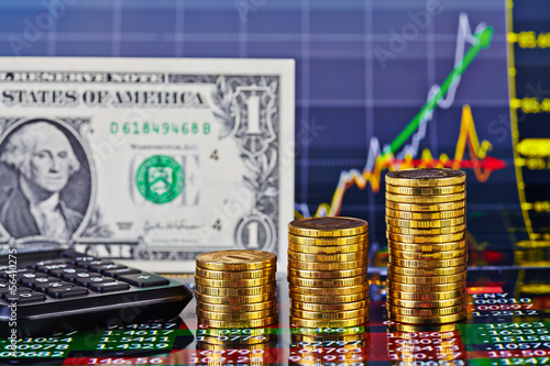 Uptrend financial chart,calculator,  one-dollar banknote and sta