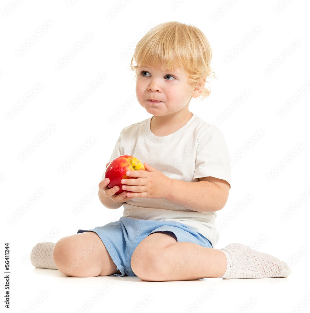 serious kid eating healthy food isolated serious kid eating healthy food isolated