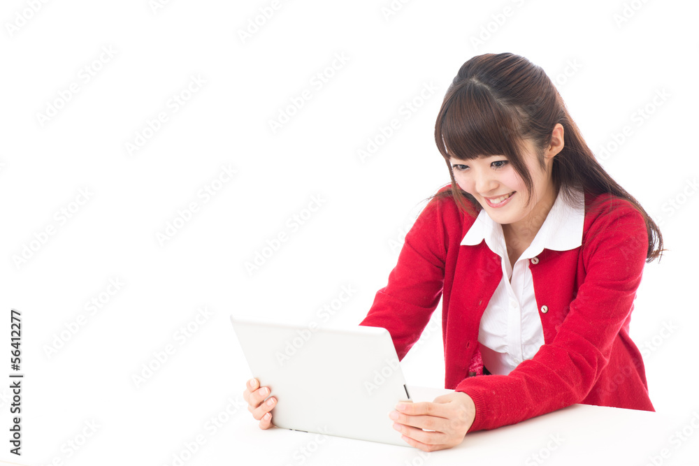 attractive asian woman using tablet computer attractive asian woman using tablet computer