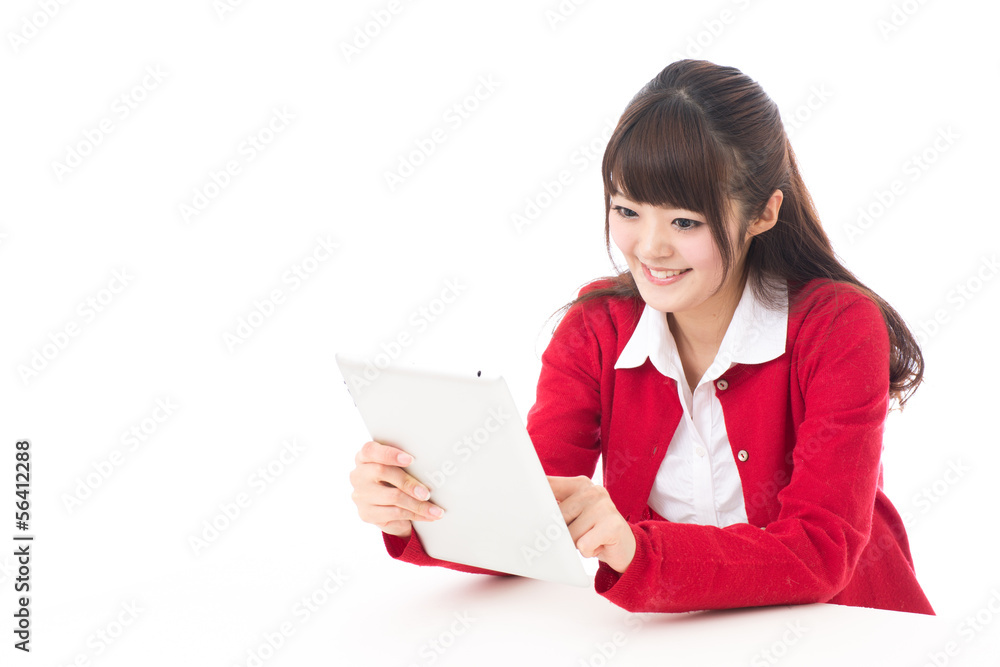 attractive asian woman using tablet computer attractive asian woman using tablet computer