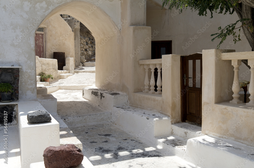 Kamari village on the island of Santorini in Greece. - obrazy, fototapety, plakaty 