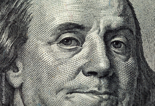 Fragment of one hundred dollars bill with face of Benjamin Frank