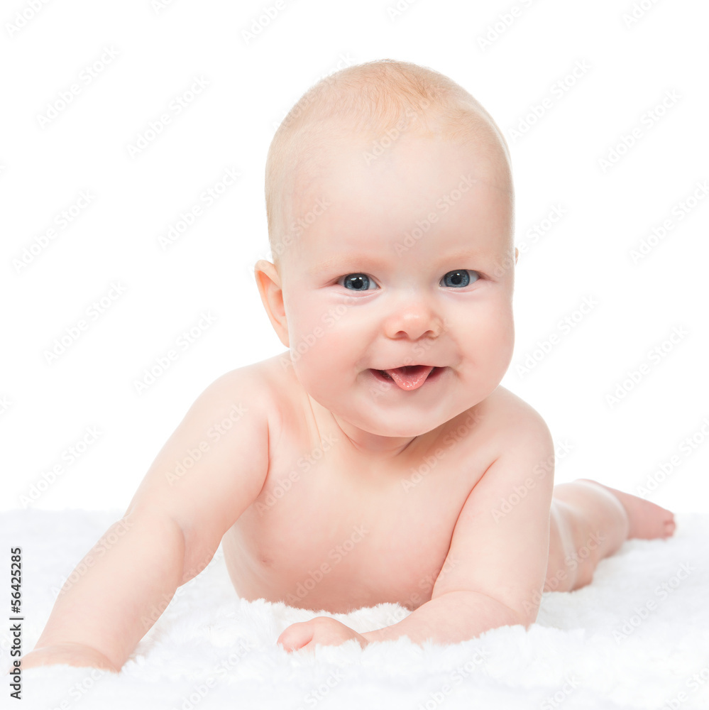 Infant child baby boy lying happy smiling on blanket Infant child baby boy lying happy smiling on blanket