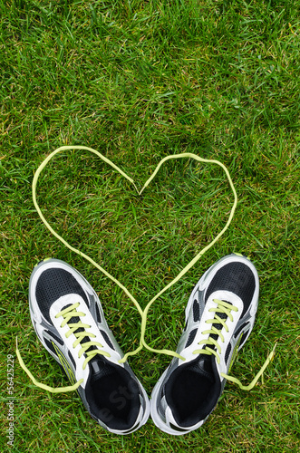 Sneakers on grass with heart