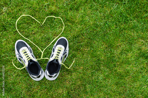 Sneakers on grass with heart