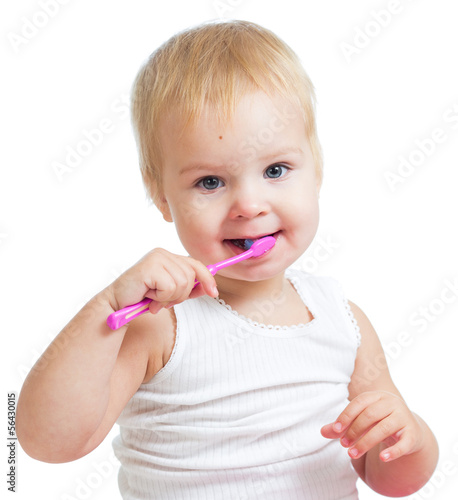 child girl brushing teeth isolated on white