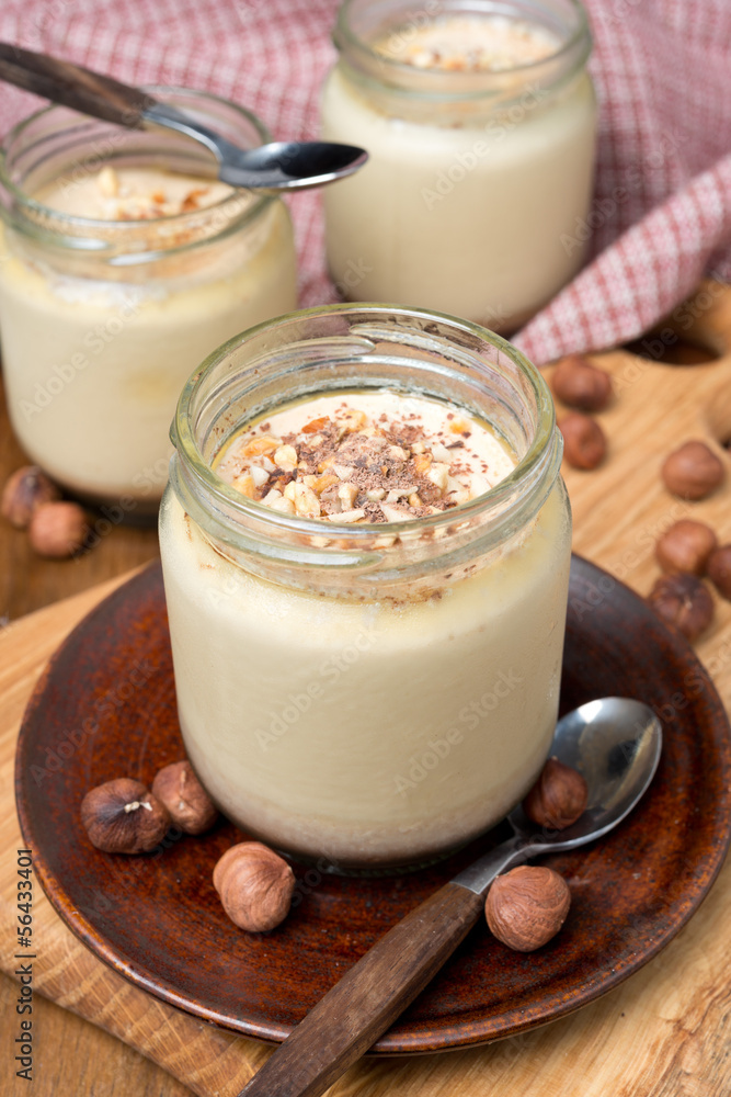 chocolate and coffee yogurt with nuts in portions jars chocolate and coffee yogurt with nuts in portions jars
