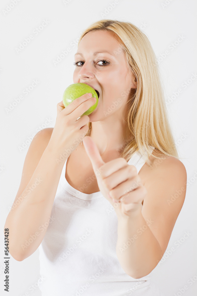 beautiful blonde woman eating green apple beautiful blonde woman eating green apple