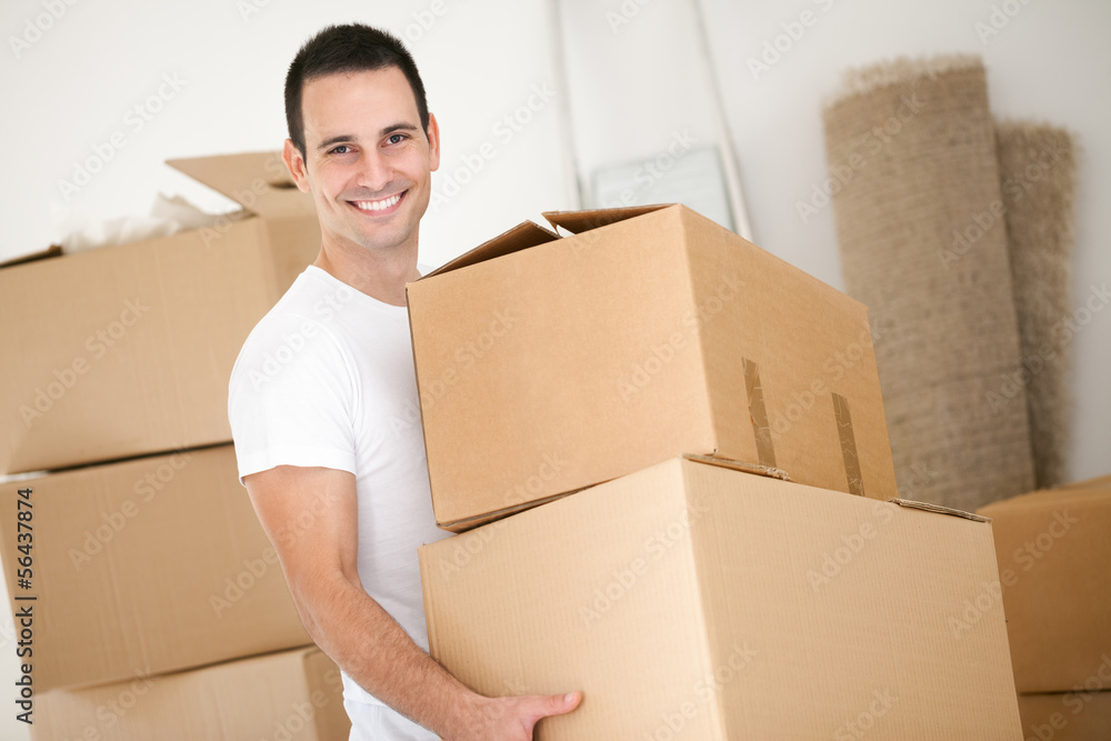 Cheerful man with cardboard box Cheerful man with cardboard box