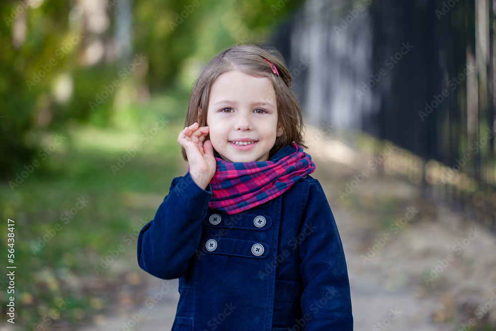 Portrait of preschooler girl in the autumn park Portrait of preschooler girl in the autumn park