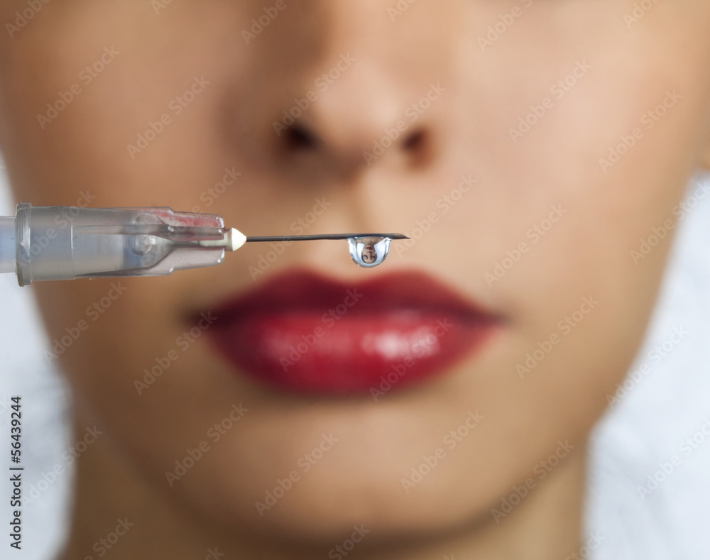 Obraz premium Woman with syringe