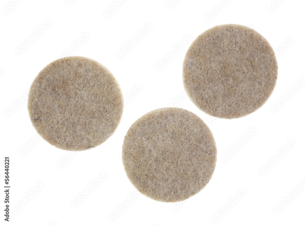 Three felt surface protectors on a white background Three felt surface protectors on a white background