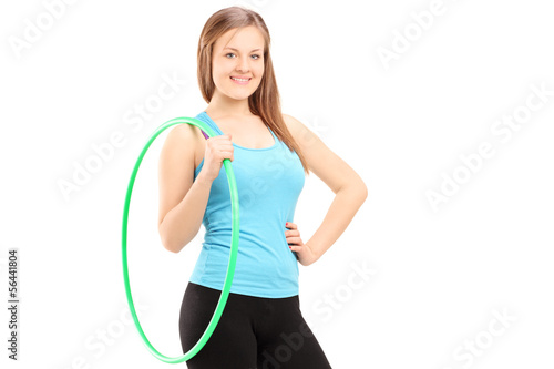 Young female athlete holding a hula-hoop © Ljupco Smokovski