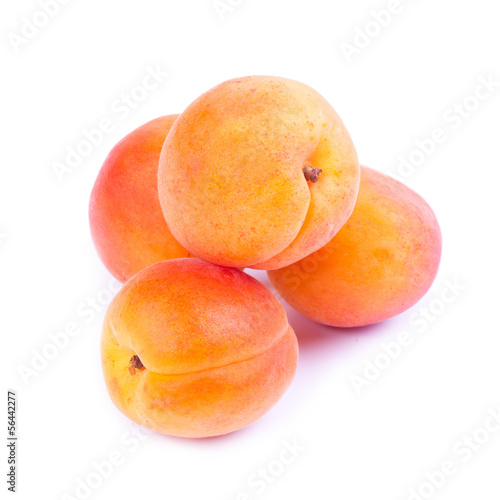 Ripe apricot fruit isolated on white background.