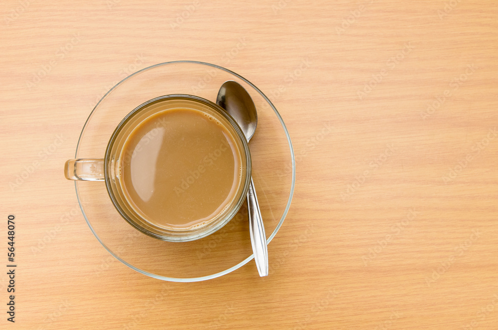 top view of hot Coffee on the wooden table top view of hot Coffee on the wooden table