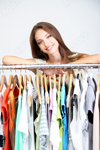 Beautiful young woman near ...