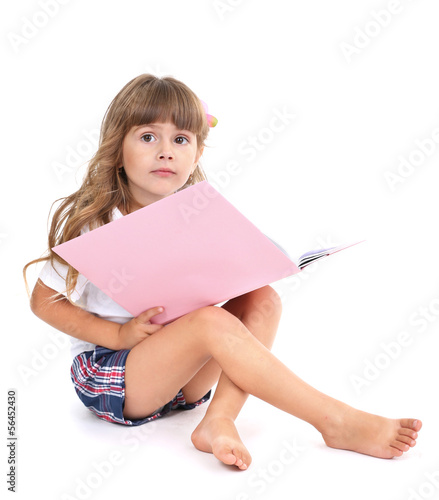 Little girl sitting on floo...