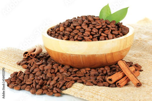 Coffee beans in bowl on white background