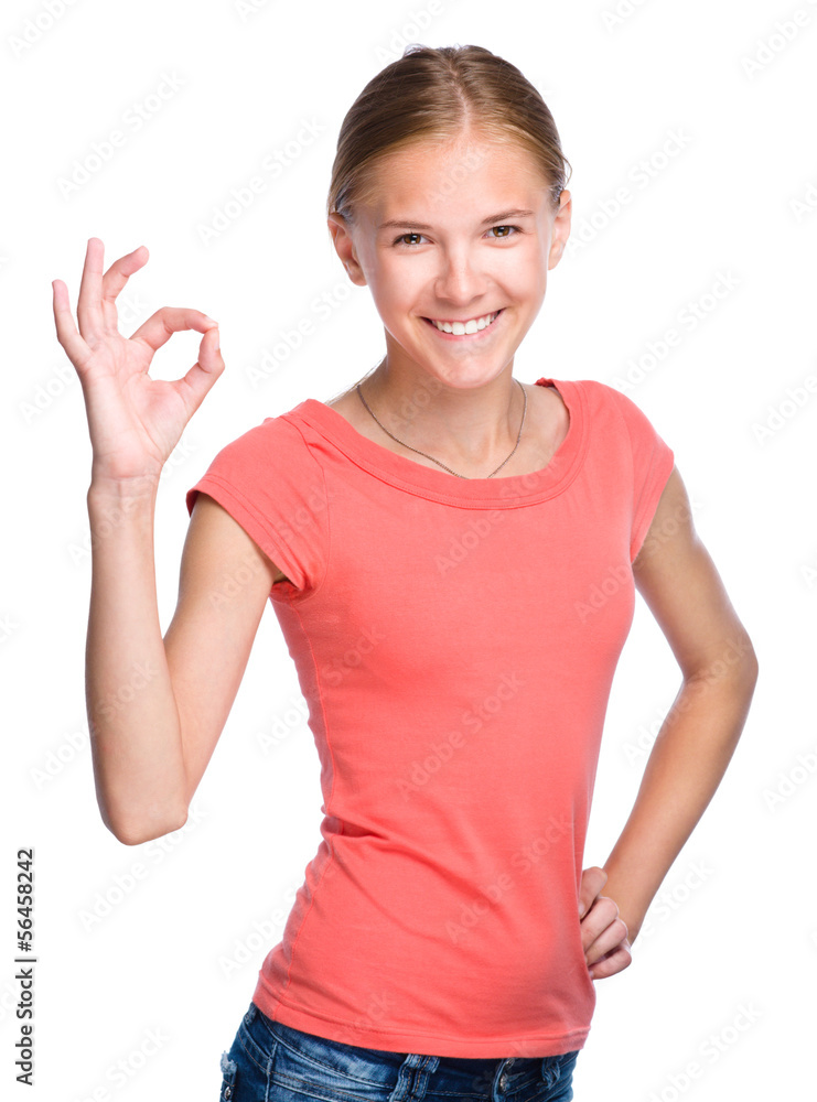 Young teen girl is showing OK sign Young teen girl is showing OK sign