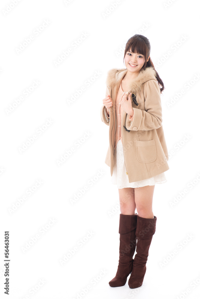 young asian woman wearing coat on white background young asian woman wearing coat on white background