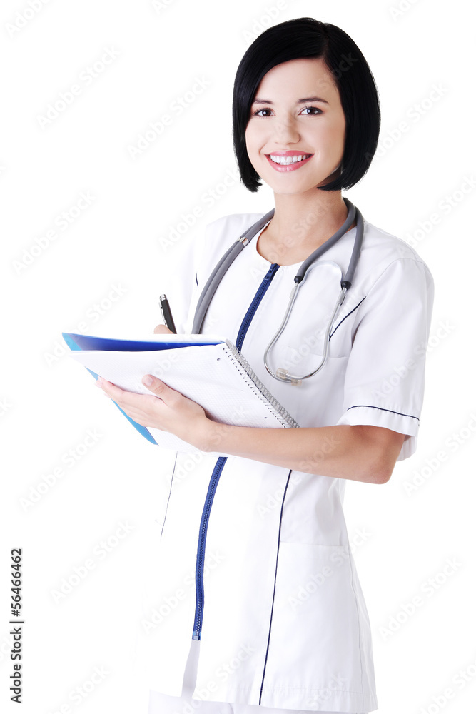 Attractive medicine student or doctor with notebook Attractive medicine student or doctor with notebook