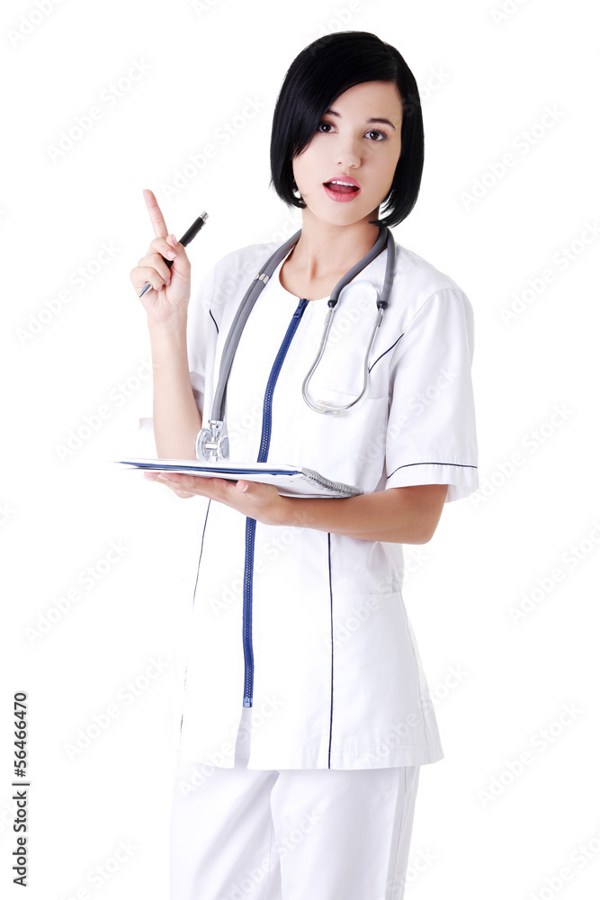 Attractive medicine student or doctor with notebook Attractive medicine student or doctor with notebook