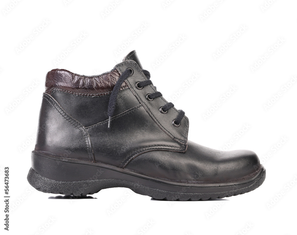 Man's black shoe. Man's black shoe.