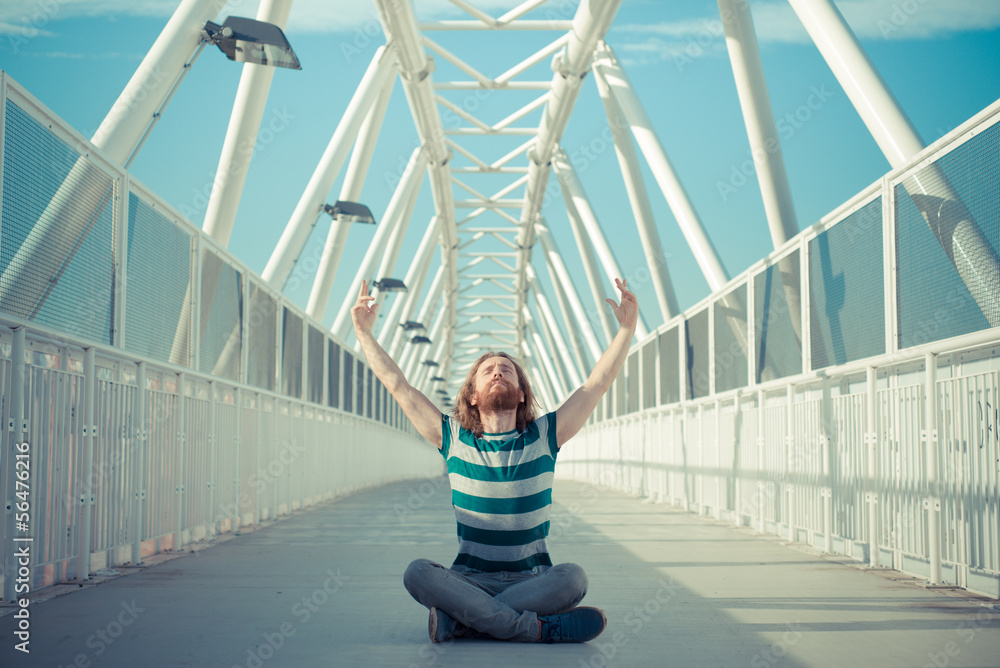 stylish hipster model with long red hair and beard yoga stylish hipster model with long red hair and beard yoga