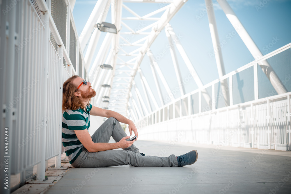 stylish hipster model with long red hair and beard lifestyle on stylish hipster model with long red hair and beard lifestyle on