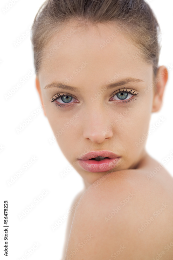 Serious brunette model posing looking at camera Serious brunette model posing looking at camera