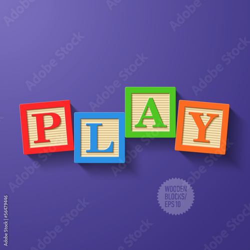 Wooden blocks arranged in the word PLAY