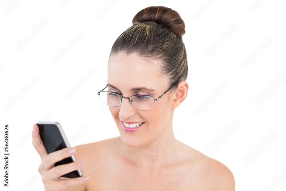 Woman wearing glasses looking at her phone Woman wearing glasses looking at her phone
