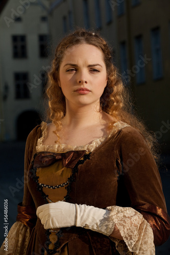 Medieval style girl at the street of tallinn