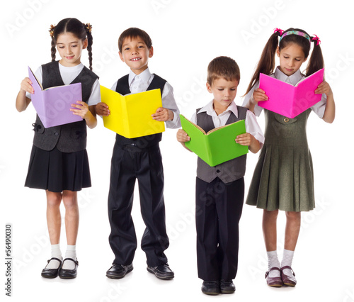 Smiling kids standing with books