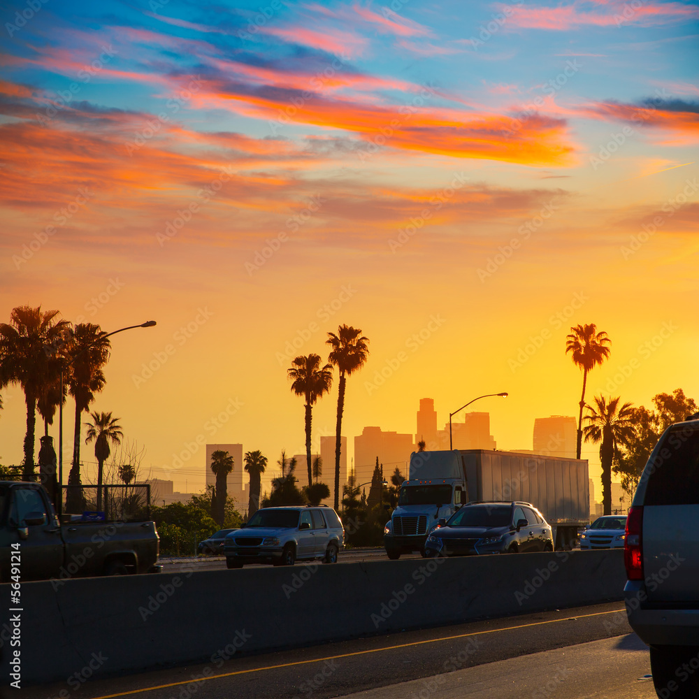 Obraz premium LA Los Angeles sunset skyline with traffic California